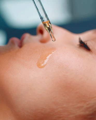 woman with oil drop on face